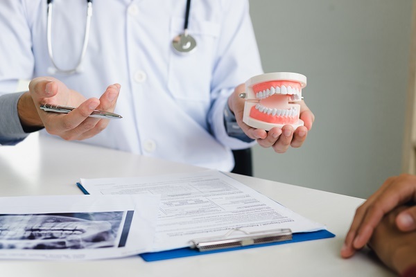 Dental Implants or Dentures